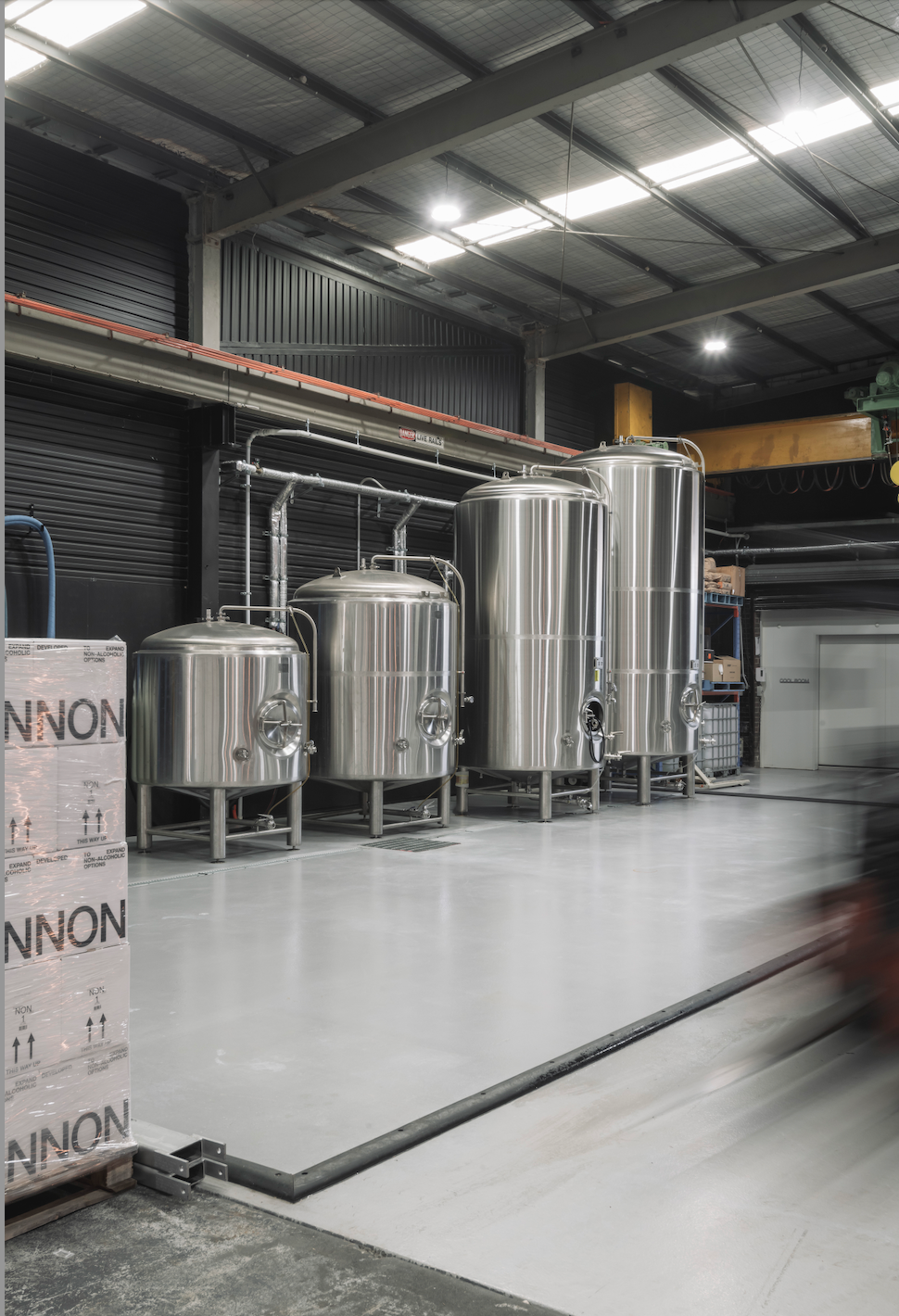 NON being poured beside the production tank