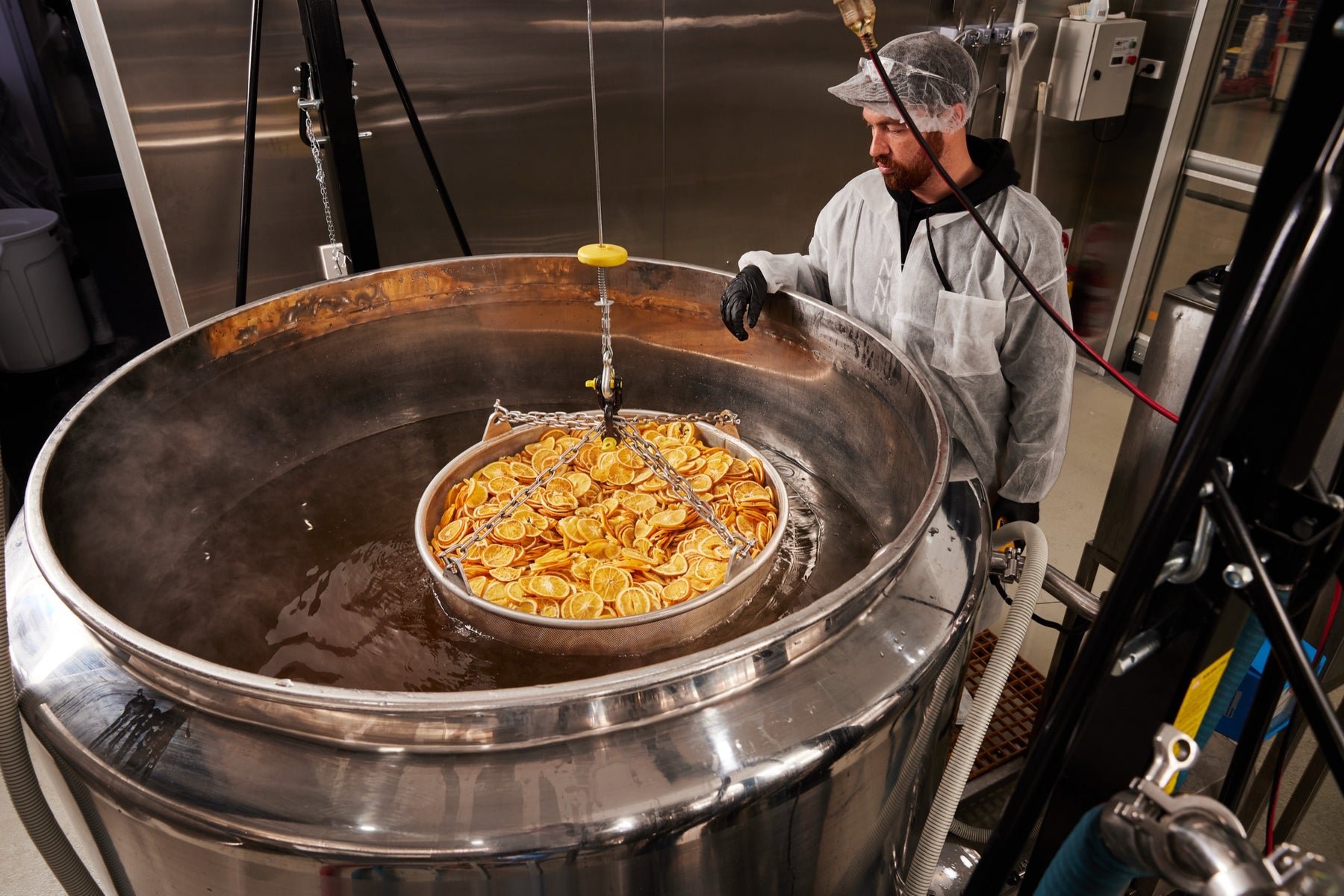 Dehydrated oranges lowered into the steep tank at NONHQ